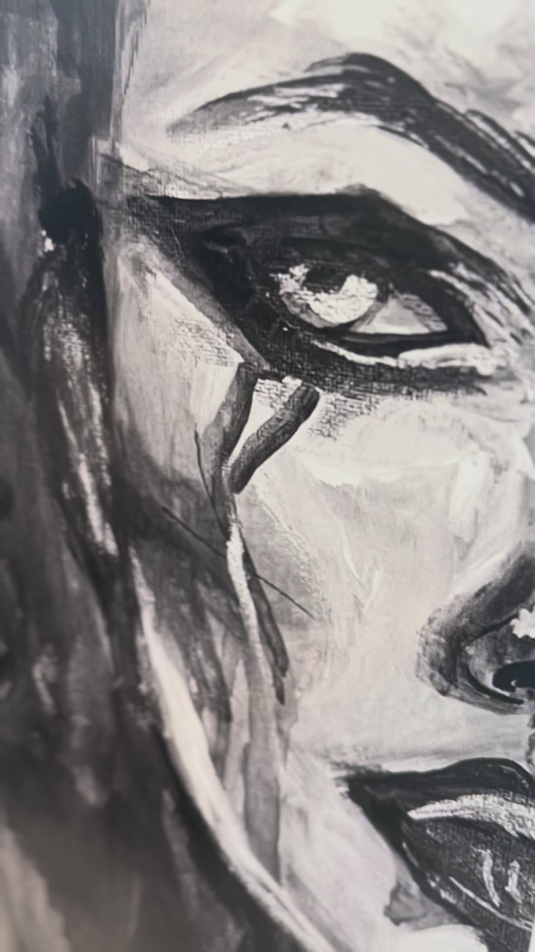 Up close video showing the details in the eyes lips and nose of the feminine face 